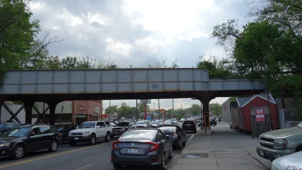 The site of the former Parkside LIRR station of the Rockaway Beach Branch, on Metropolitan Avenue between Selfridge Street and Trotting Course Lane in Forest Hills / Rego Park, Queens.