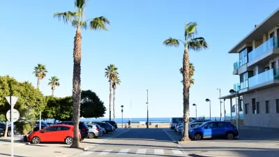 Cars parked at a beachfront building in Miami, Florida
