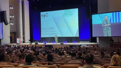View of the stage, crowd, and speaker at the opening session of NPC24.