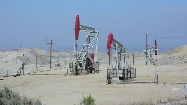 Oil derricks in oil field in California.