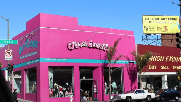 Bright pink building for Out of the Closet thrift store in San Francisco, California.