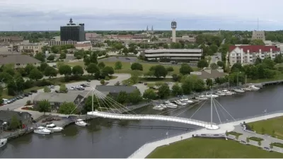 A conceptual rendering of a cable-stayed bicycle and pedestrian bridge over the Sheboygan River in Sheboygan, Wisconsin
