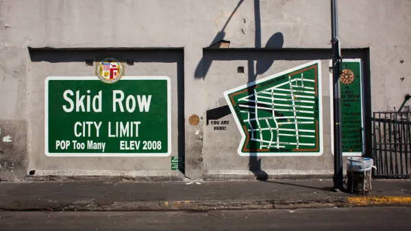 Green Skid Row mural satirizing city limit sign in downtown Los Angeles, California.