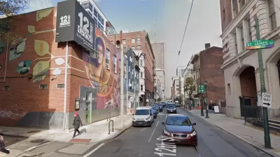 An image of a mural depicting Gloria Casarez on the outside of a gym on 12street in Philadelphia.