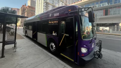 Black and purple hybrid Phoenix Public Transit bus.