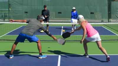 A mixed-doubles game of pickleball.
