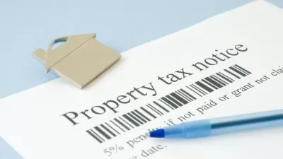 Property tax bill notice with pen