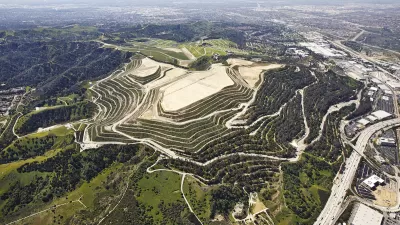 Aerial view of Puente Hills landfill on green hill in Los Angeles County, California.