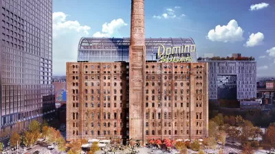 Historic brick sugar refinery building redeveloped with glass office tower inside and yellow Domino Sugar sign