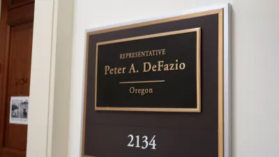 A plaque displaying the name of Re. Peter A. DeFazio, senate representative for the state of Oregon.