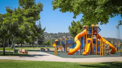 Playground with yellow slides in Rimgrove Park, Los Angeles County