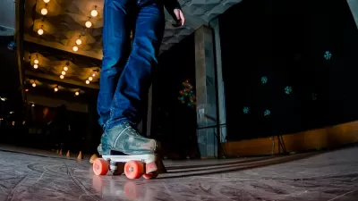 Close-up image of person skating on indoor roller rink