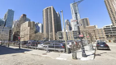 Google Street view of 250 Water Street parking lot with tall buildings in background