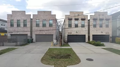 Two-story split lot housing in Houston, Texas with two-car garages