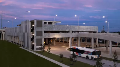 View of Westpark/Lower Uptown transit center in Houston with bus exiting three-story garage vuilding and purple sunset sky in background