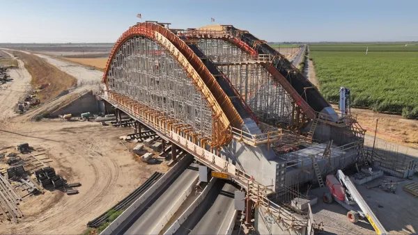 Arched bridge under construction for California High-Speed Rail project.