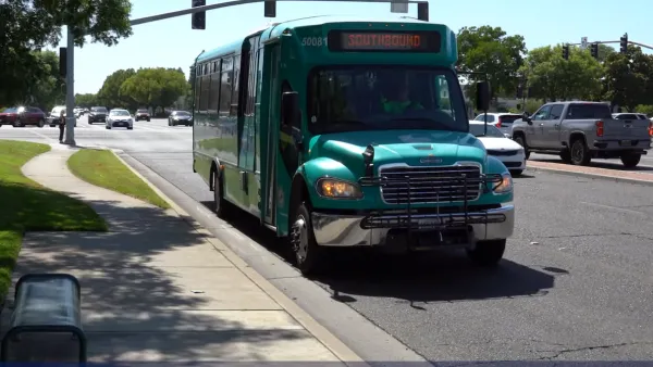 Teal mini-bus in CLovis, California.