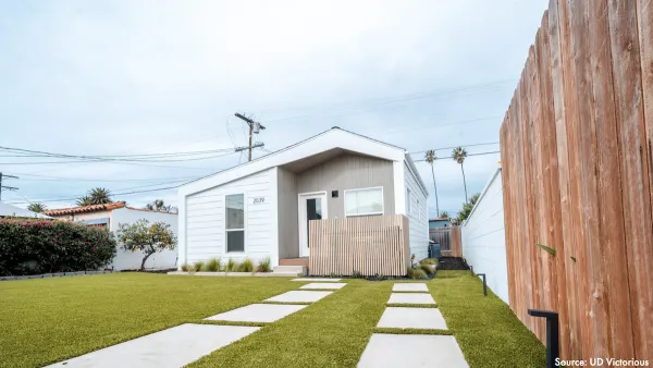 Small light colored backyard dwelling unit.