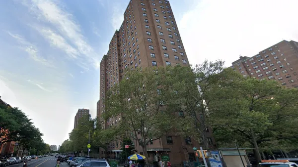 Tall brick public housing project in Bronx, New York City.