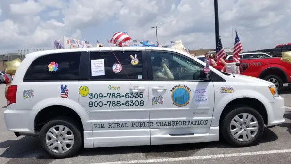 White microtransit van in Rock Island County, Illinois.