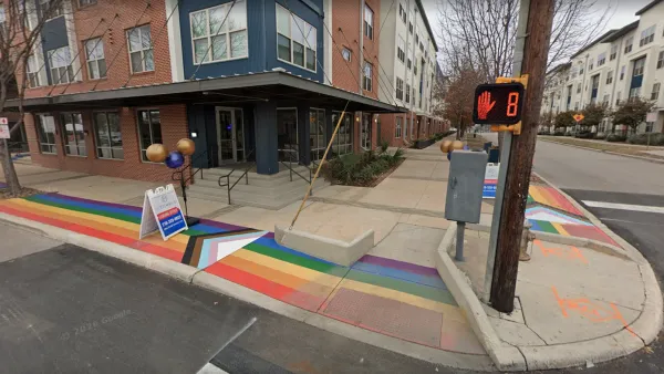 A sidewalk painted with a rainbow in San Antonio