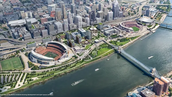 Rendering of aerial view of stadium on riverfront with high-rise buildings, parks, and roadways around it in Cincinnati, Ohio.