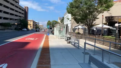 Red painted dedicated bus lane in Indianapolis, Indiana