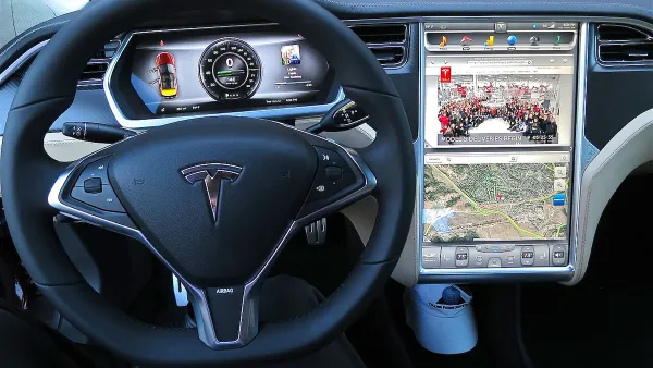 Tesla Model S dashboard with digital panels.