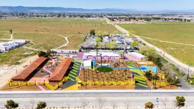 Aerial view of The Sierras, a colorful converted motel now serving as transitional housing in Lancaster, California.