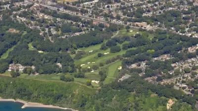An aerial view of the Toronto Hunt Club and golf course, located along Lake Ontario amid residential homes in Toronto.