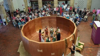‘Umeke Lā‘au: Culture Medicine art installation - giant wooden sculpture of calabash with people standing inside.