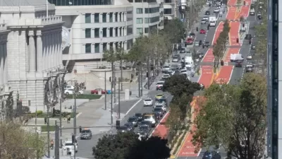 View of Van Ness Avenue, San Francisco, with red bus-only lanes
