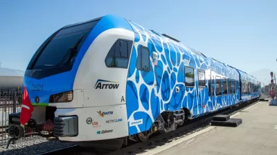 Blue and white Zero-Emission Multiple Unit (ZEMU) hydrogen-powered train in San Bernardino, California.