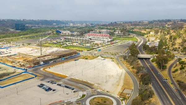 Aerial of graded lot next to highway in Mission Valley, California.