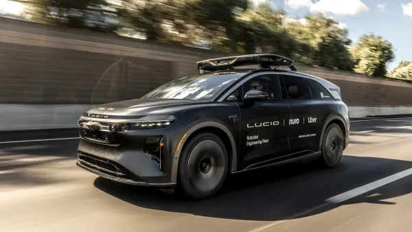 A black robotaxi