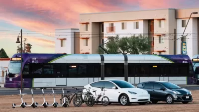 Rendering of electric scooters, electric cars, light rail train, and apartments in background.