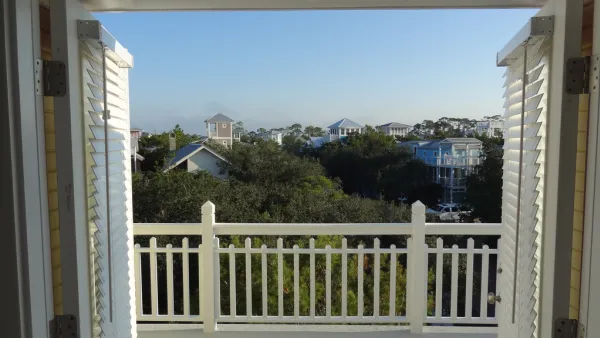 view out a window of rooftops of Seaside, Florida 