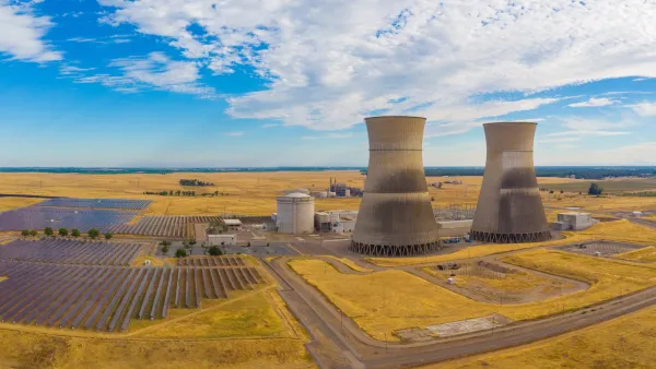 Rancho Seco Nuclear Power Plant cooling towers above solar panels plant.
