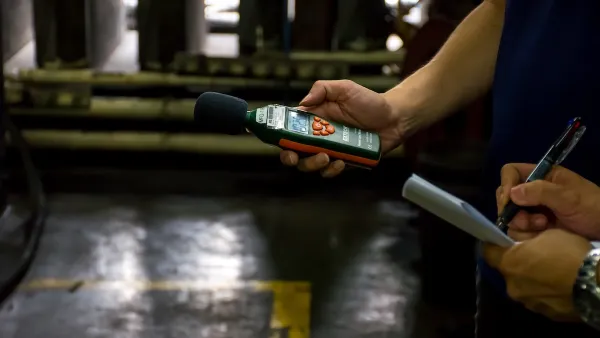 Engineers use sound level meter to measure sound level of generator and recording data.
