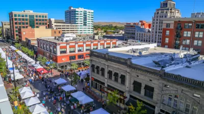 Aerial view of farmers' market with white booths in downtown Boise, Idaho