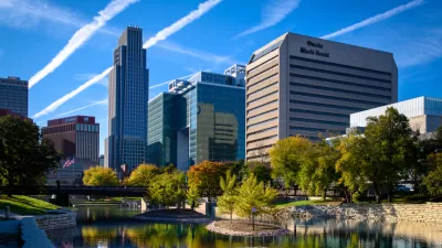 View of Omaha, nebraska skyline with river in foreground