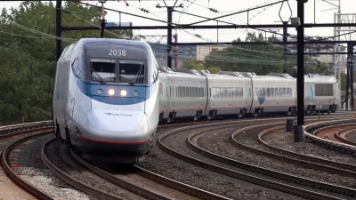 Amtrak Acela Express train passing through Harrison station in Newark, New Jersey