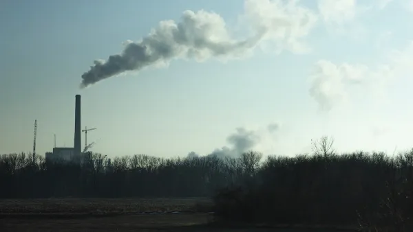 A coal power plant in Iowa billows smoke into the air.