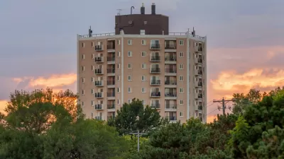 View of high-rise apartment building in St. Paul, Minnesota at sunset