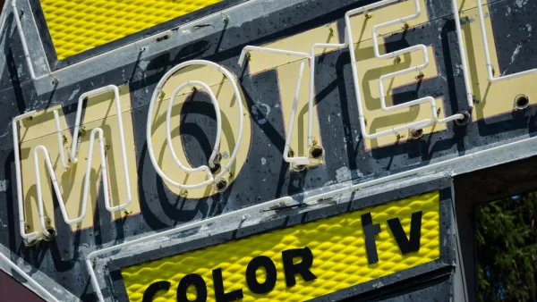 Yellow and black motel sign