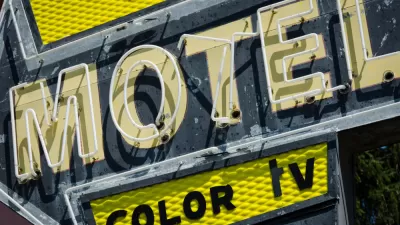 Yellow and black motel sign