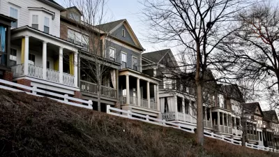 Wooden rowhouses with white fences in Atlanta, Georgia