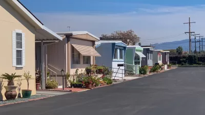 Row of manufactured homes on an asphalt street