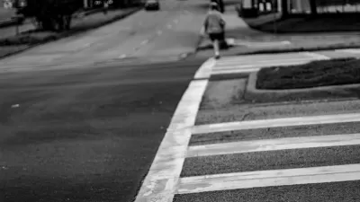 Black and white photo of crosswalk