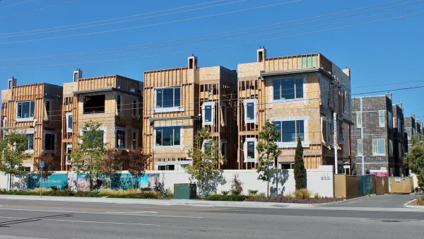 Three-story apartment buildings under construction in Costa Mesa, California.